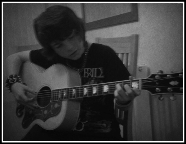 Alfie playing Gibson SJ200