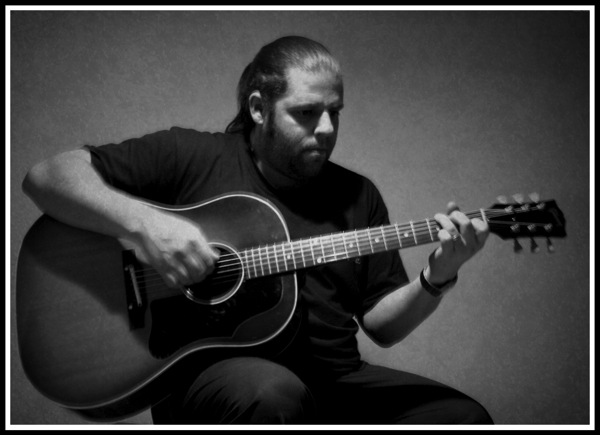 Me playing Gibson J45