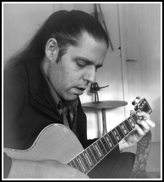 Me sat playing Alfies new guitar