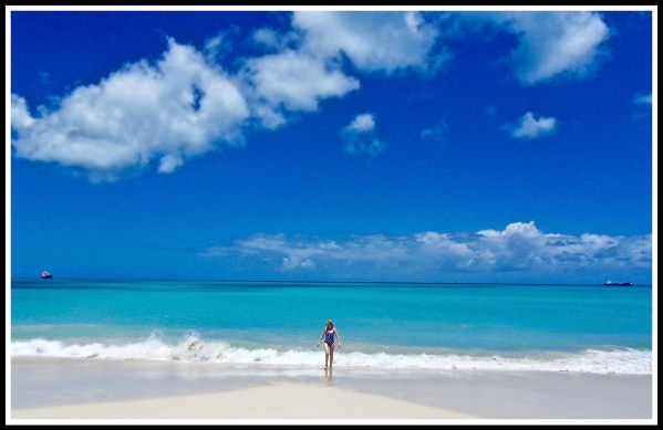 Sarah walking towards me from out of the sea after her swim
