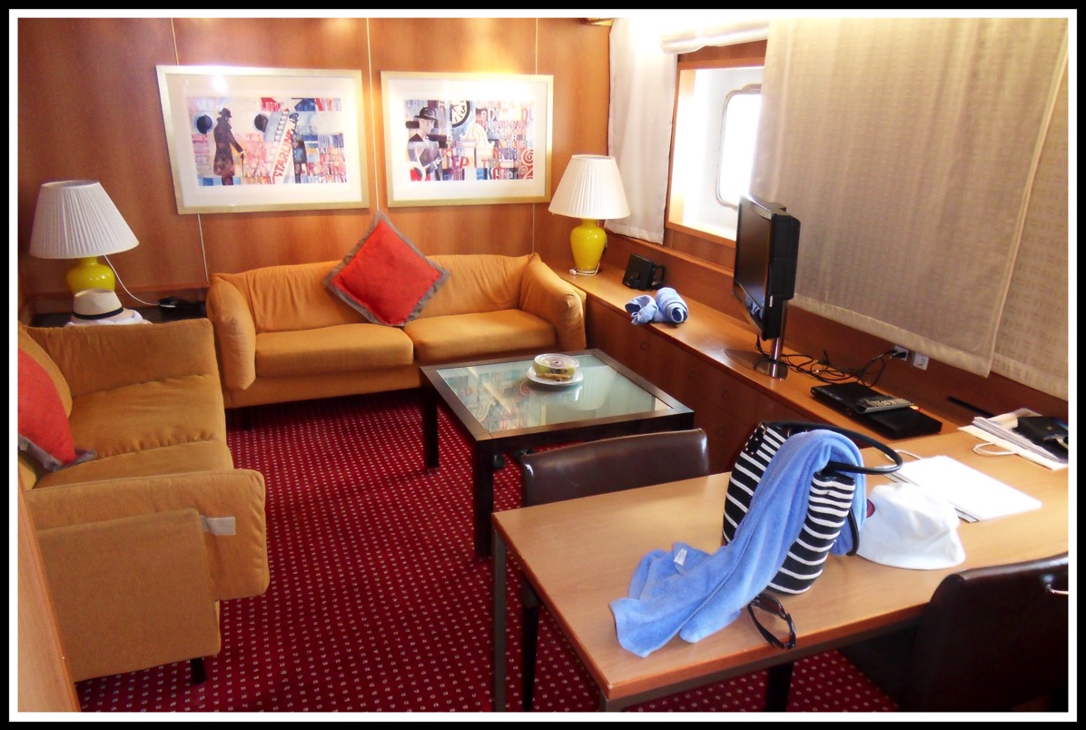 a photo of the lounge area in the suite