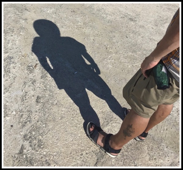 Me stood on the right with my shadow filling the rest of the photo