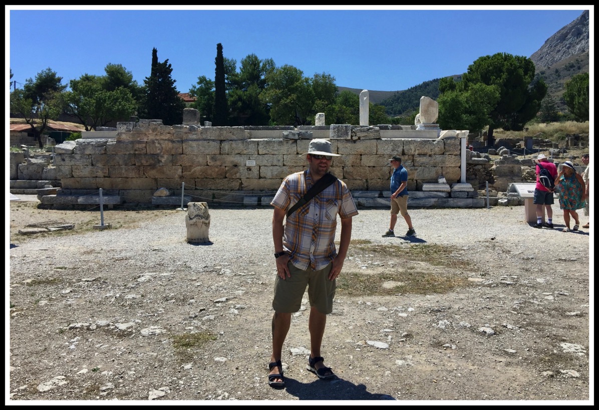 Me stood (centre) in front of the ruins of the Bema in ancient Corinth
