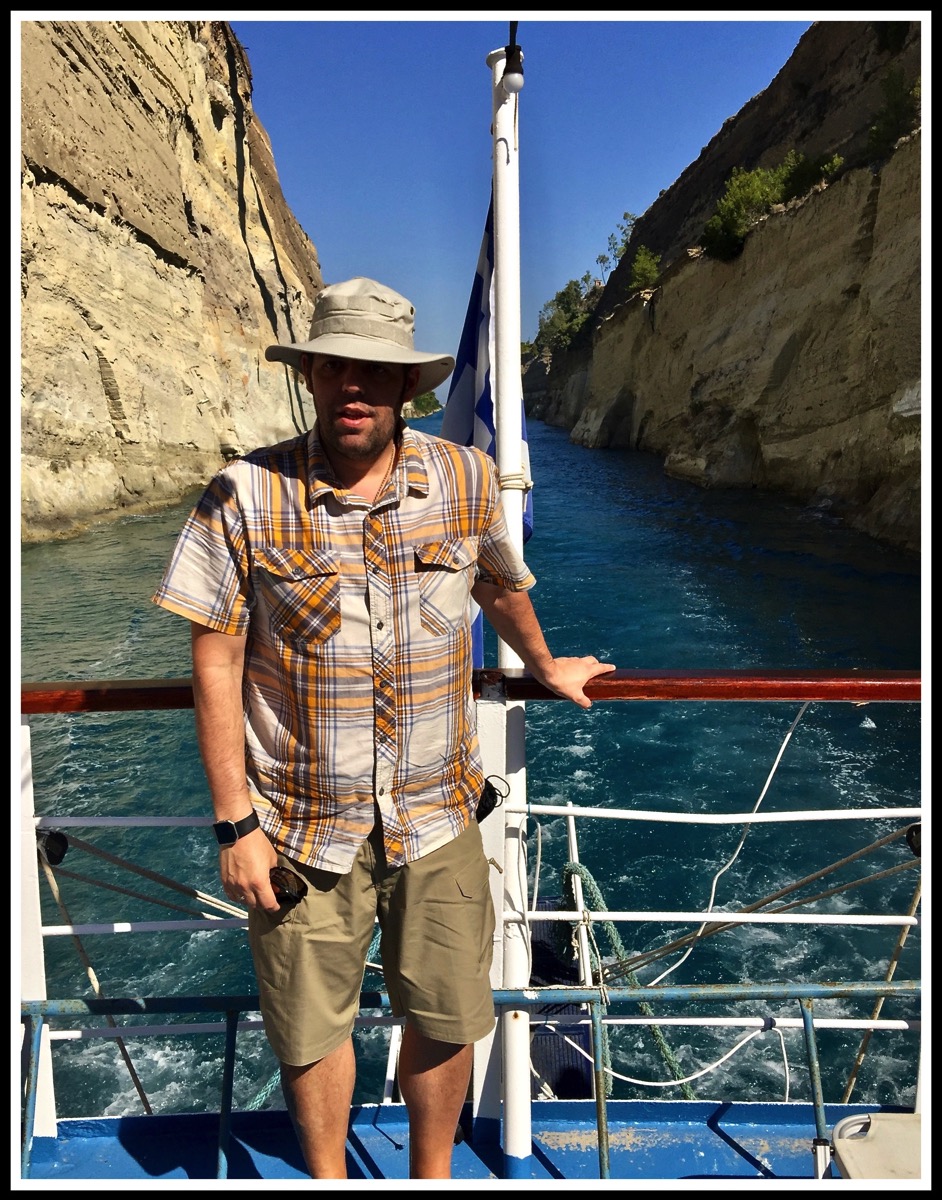 Me stood right at the rear of the boat with the beautiful Corinth canal in the background