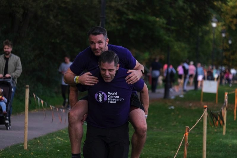 Adie on my back as i carry him on the hero carry