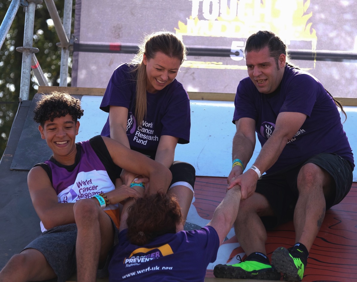 Vini, Ashley & me pulling Josie up the pyramid scheme