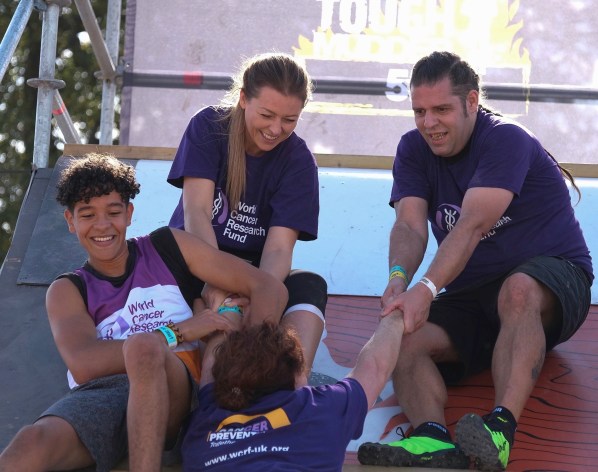 Vini, Ashley & me pulling Josie up the pyramid scheme