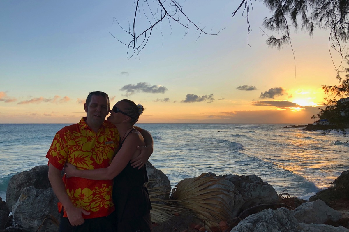 Sarah & i stood in front of the barbados sunset