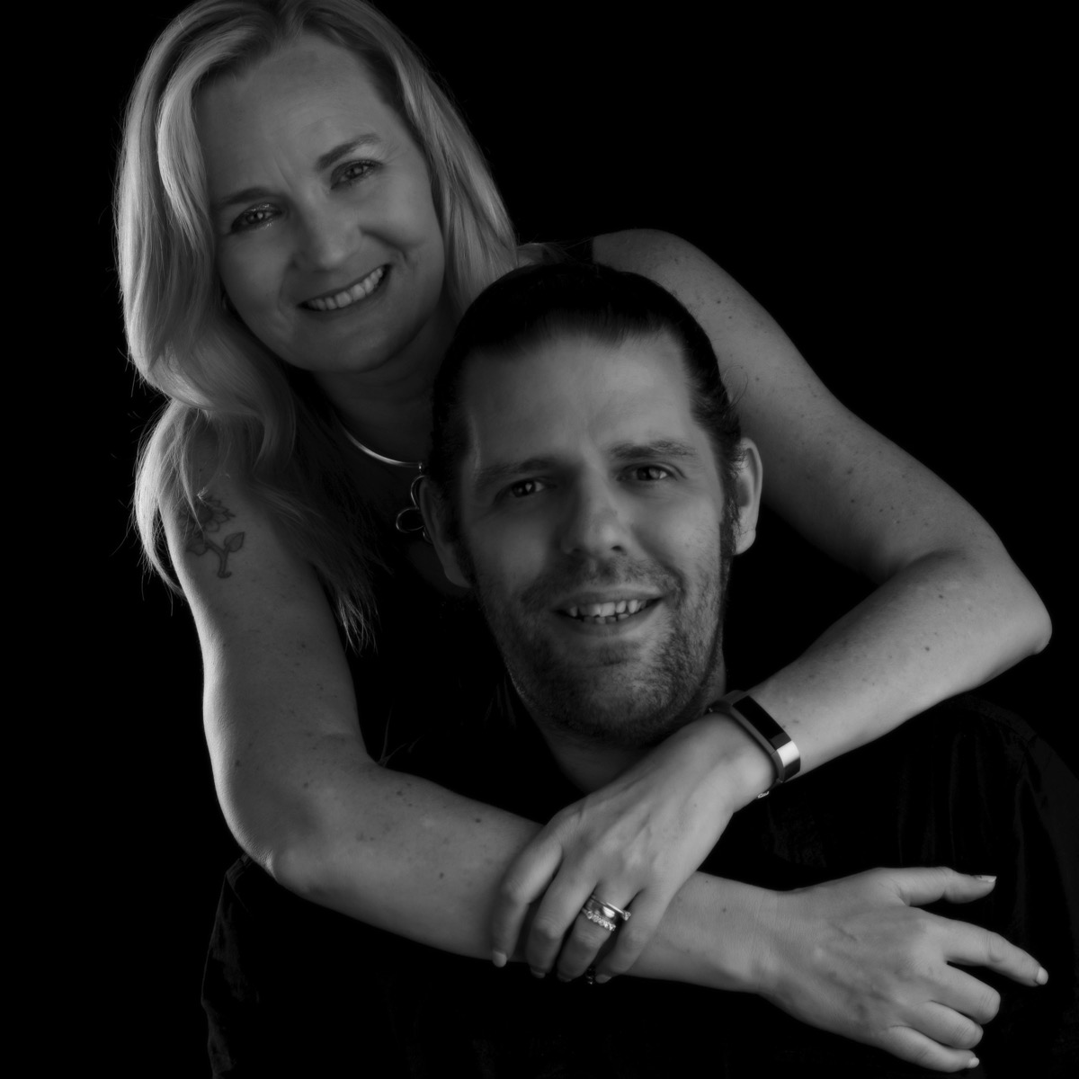 Sarah with arems around Steve