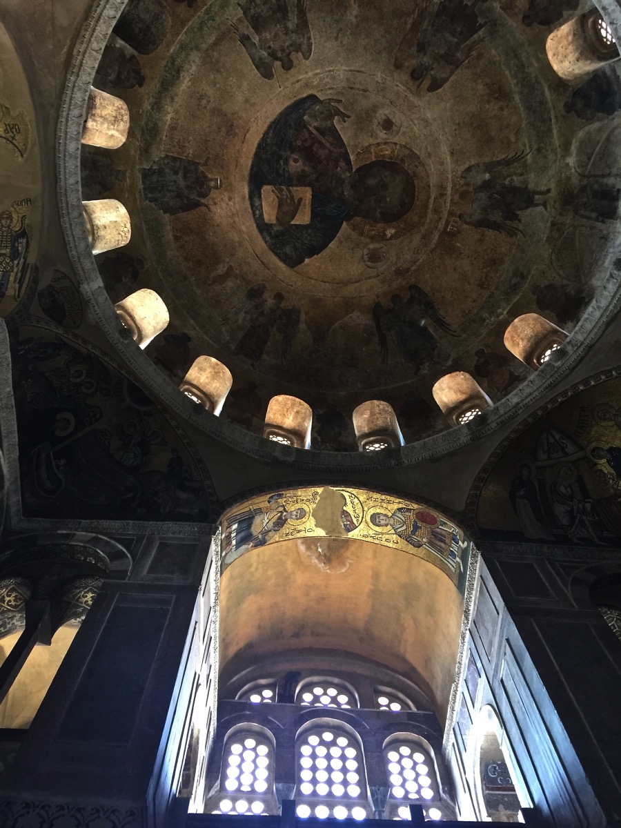 Inside and much darker image of the iside arches and roof