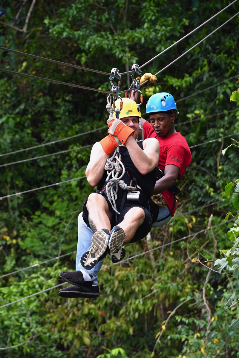 Me on the zip line with te zip line dude attached to me