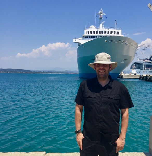 me stood directly in front of the ship