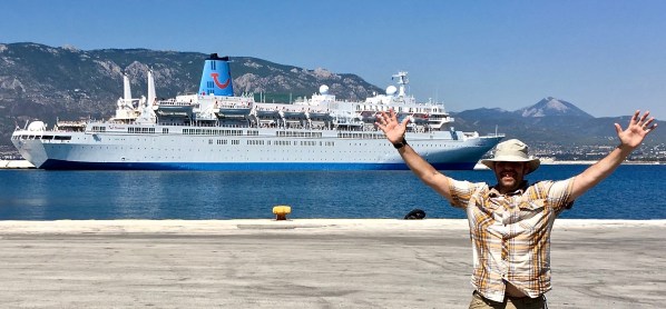 Me stood on the right with my arms out stretched and waving as the Thomson Spirit shit covers the whole background