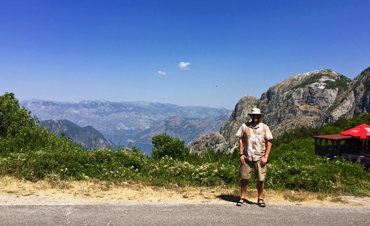 Me stood with the landscape of hills and the valley behind me