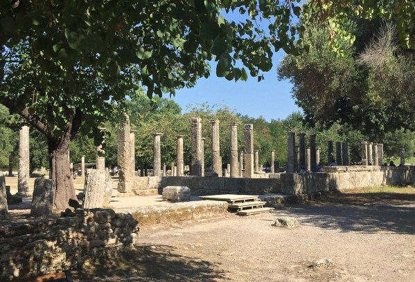 Olympic park in Olympia with lots of trees and sandy paths