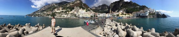 Sarah panorama of the Amalfi sea, road and mountains in the background and me in the centre of the photo