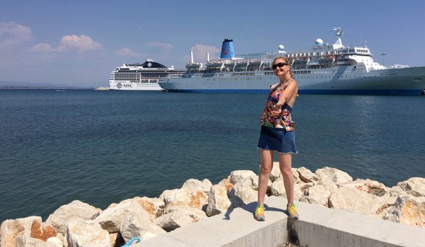 Sarah stood in front of the ship