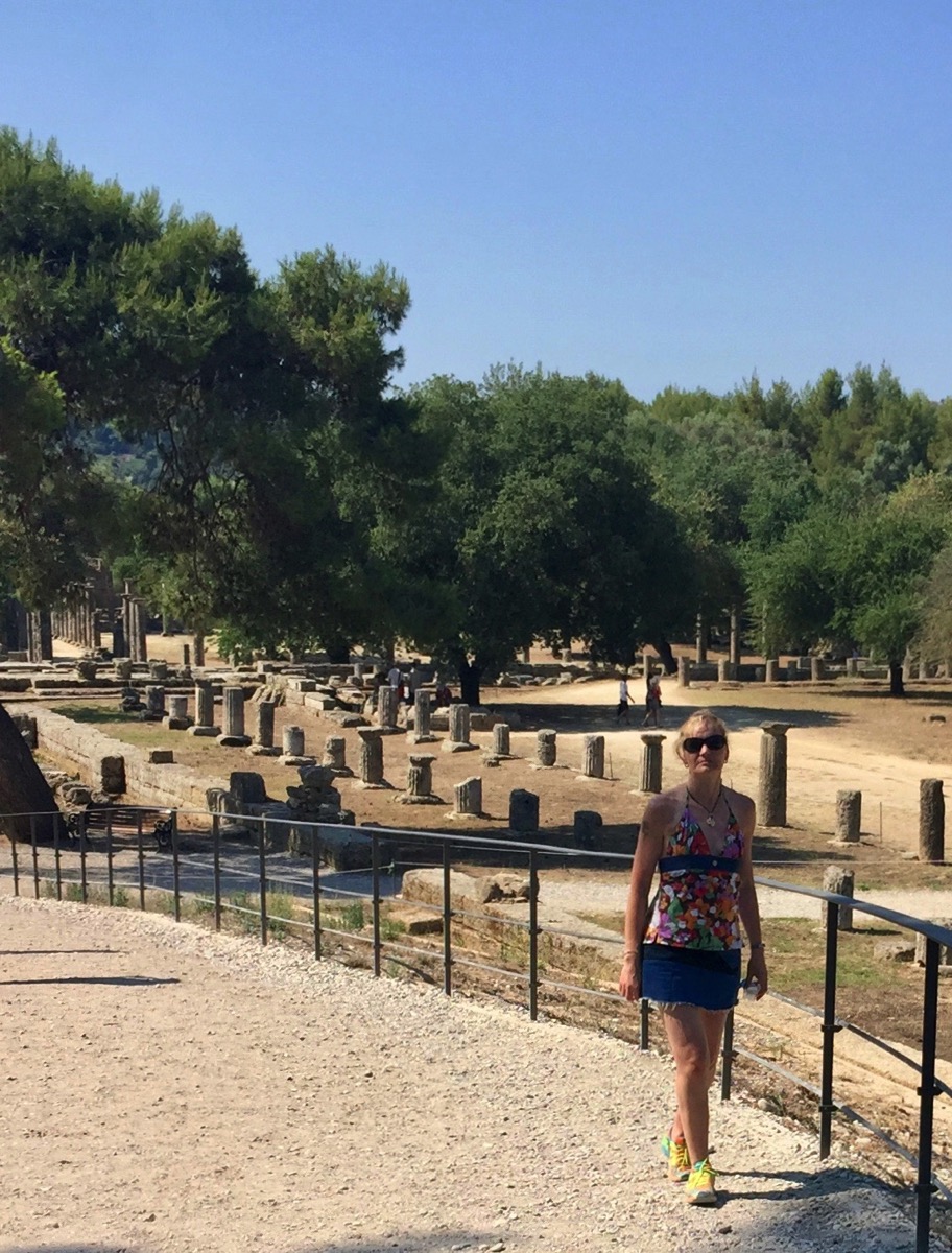 Sarah stood on the bottom right with the whole Olympic village behind her