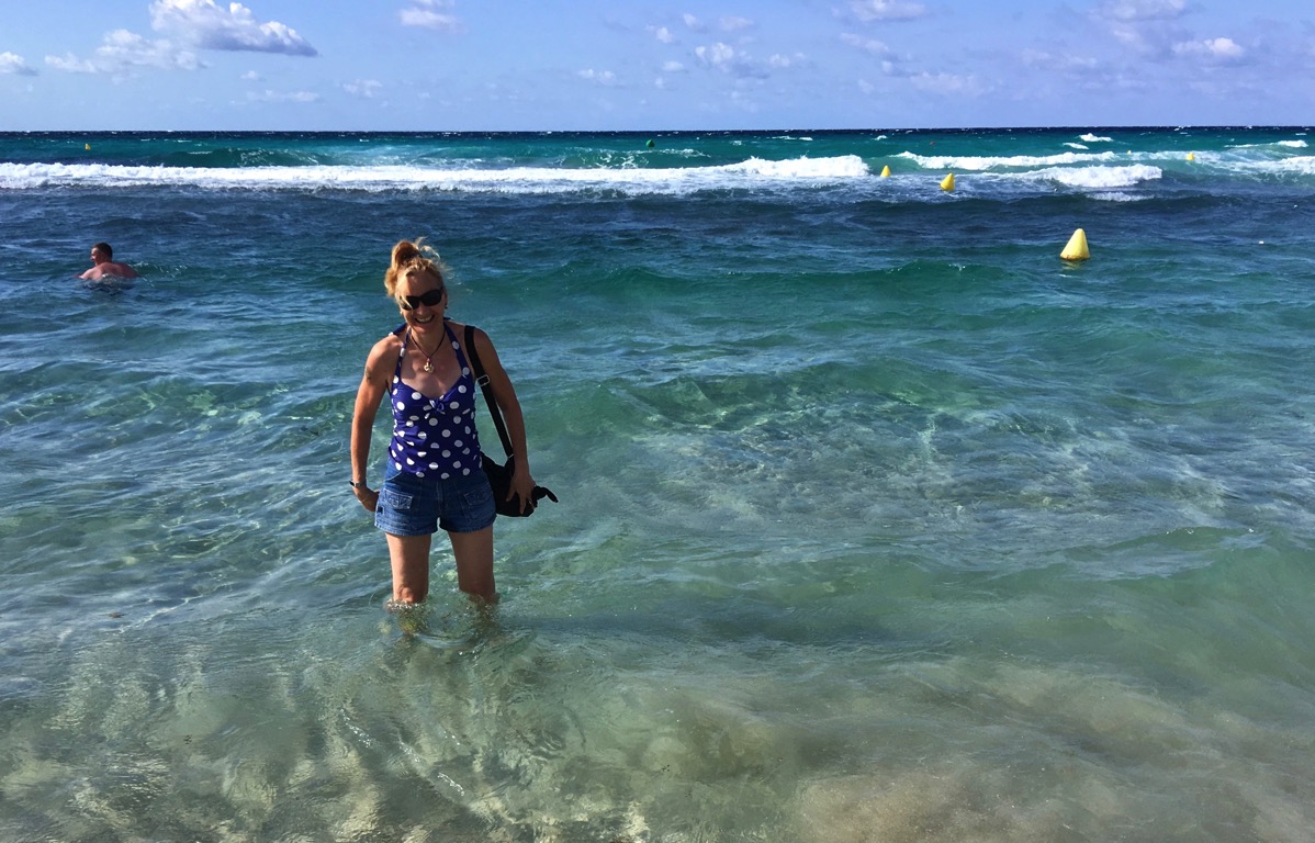 Sarah walking in the sea ath Minorca