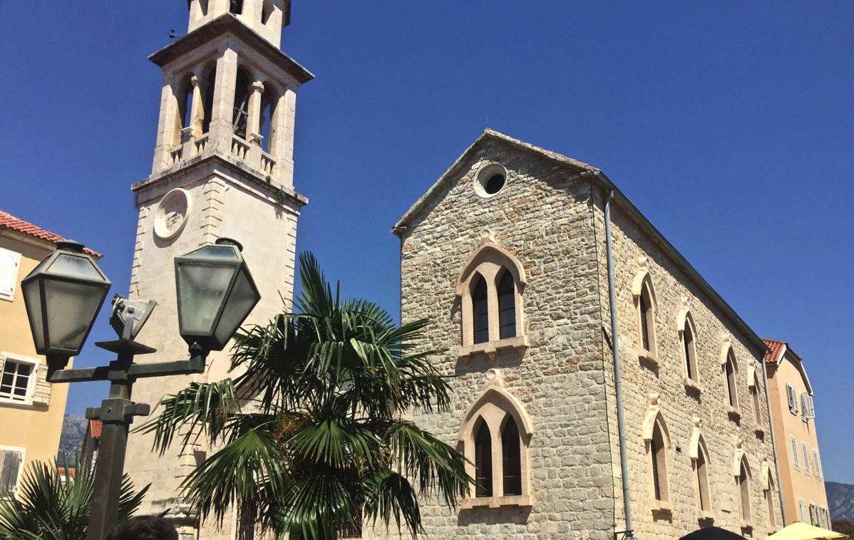 The church with the bell tower on the left