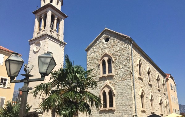 The church with the bell tower on the left