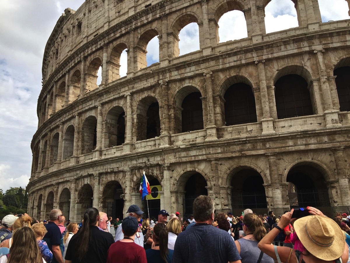 The outside of the Colosseum with all of the arches