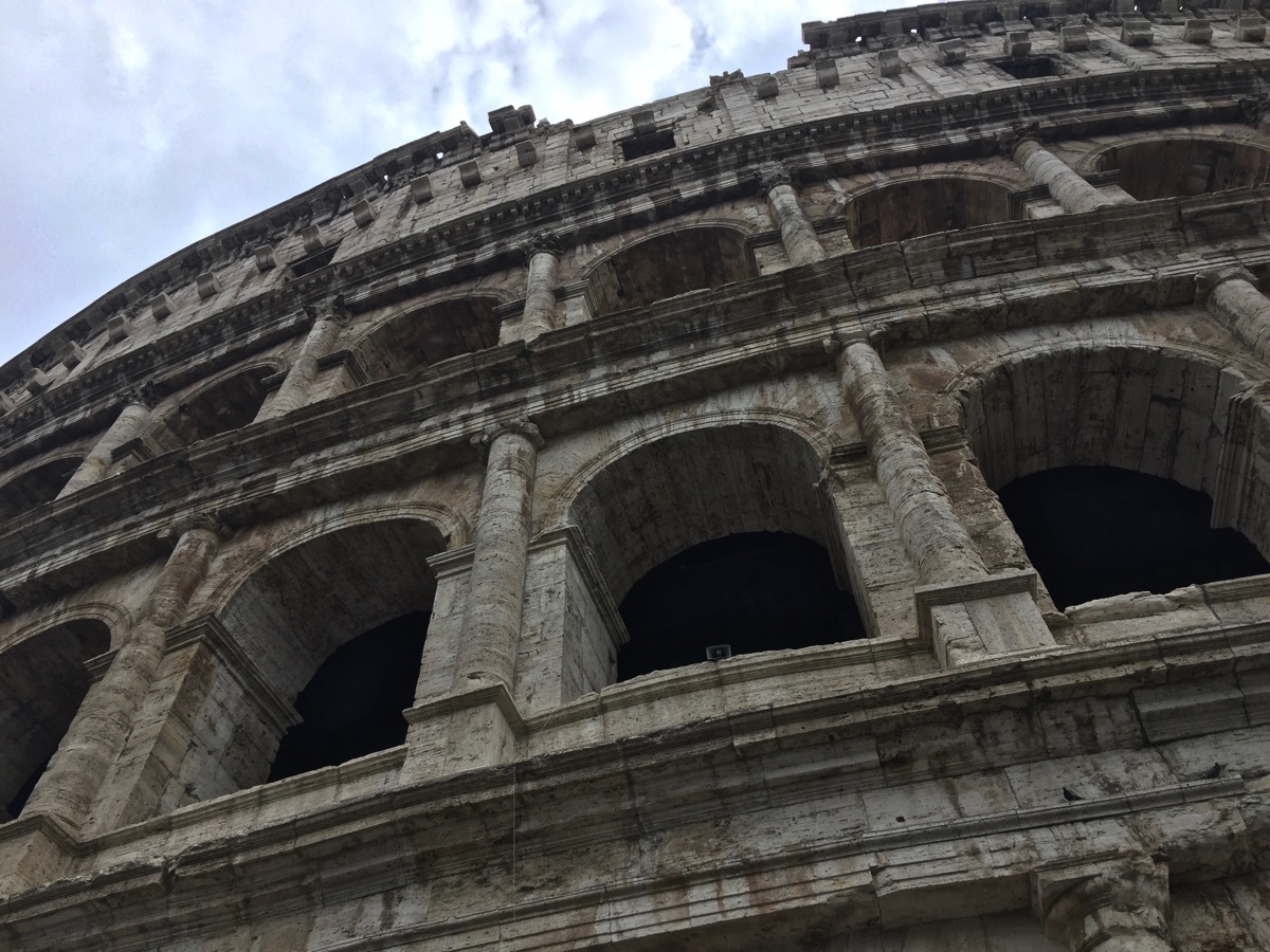 The outside of the Colosseum with all of the arches