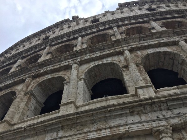 The outside of the Colosseum with all of the arches