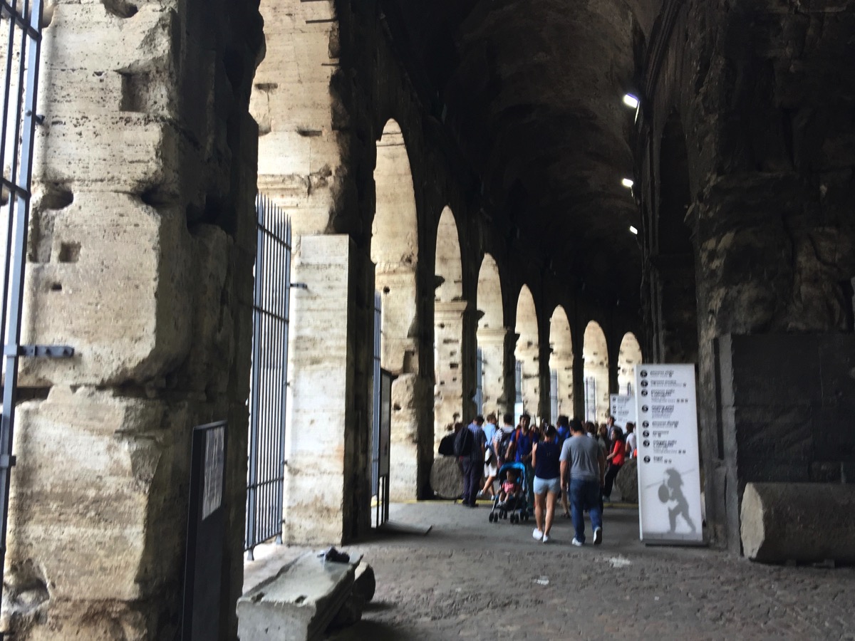 The outside of the Colosseum with all of the arches