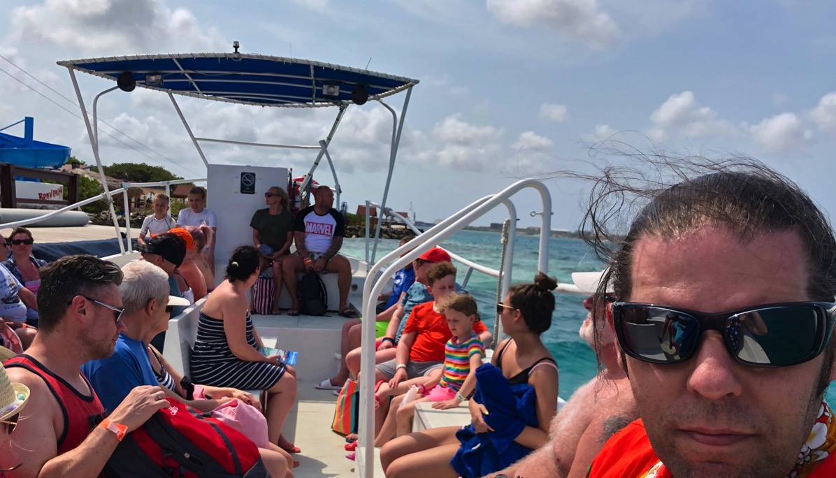 Me bottom right with a view over the little boat filled with our group