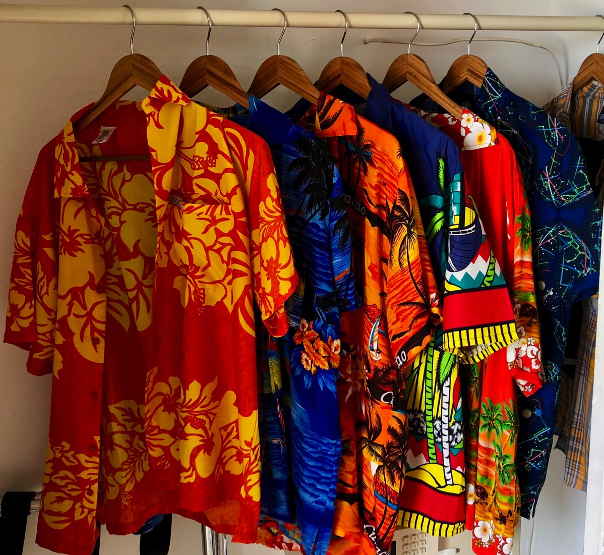All of my Caribbean shirts in a row in my wardrobe in room 112