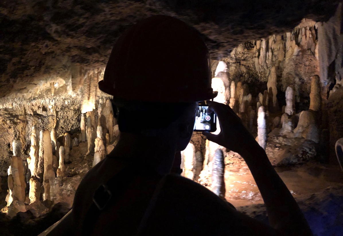 view of Harrison's cave in the dark with mood lighting