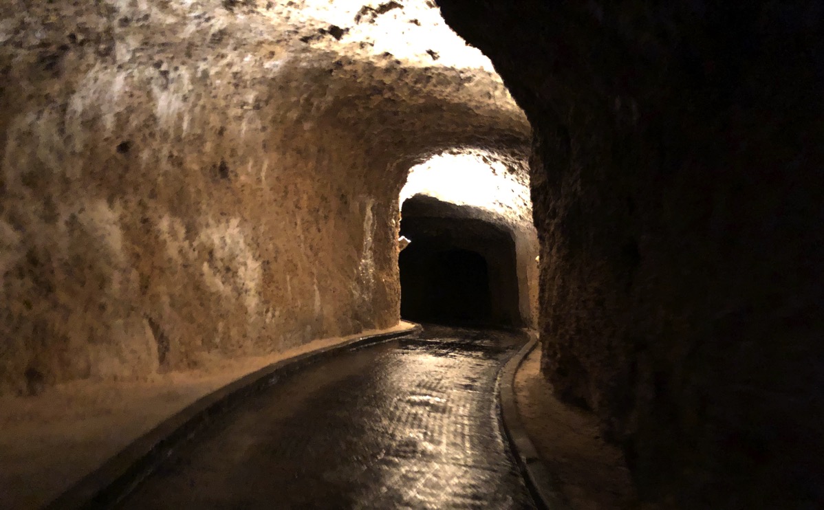 view of Harrison's cave in the dark with mood lighting