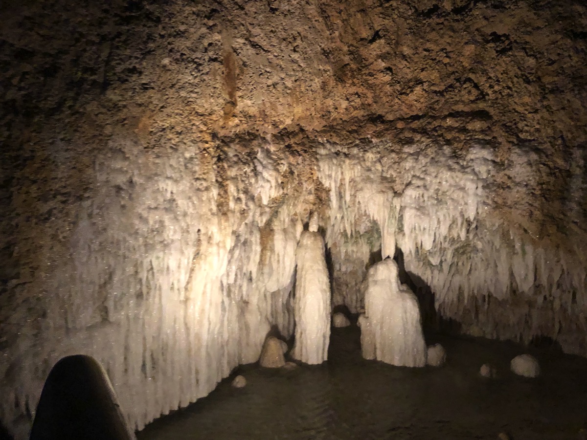 view of Harrison's cave in the dark with mood lighting