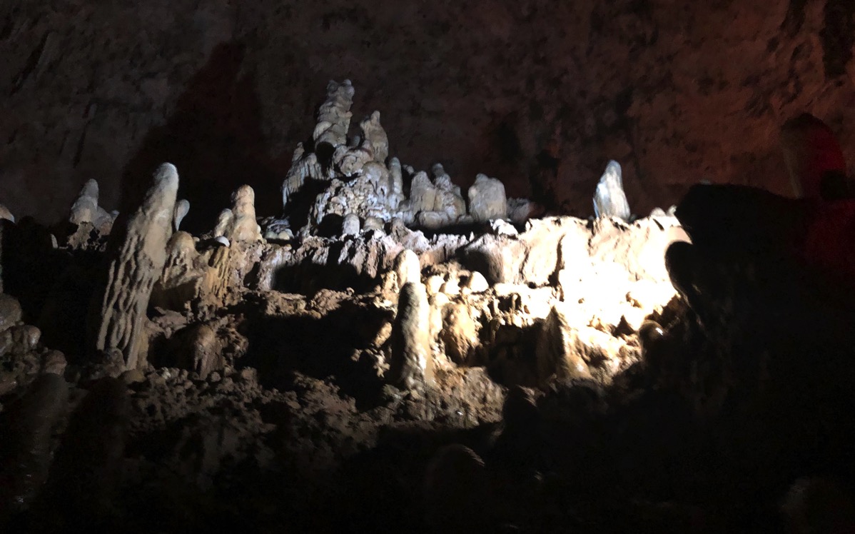 view of Harrison's cave in the dark with mood lighting