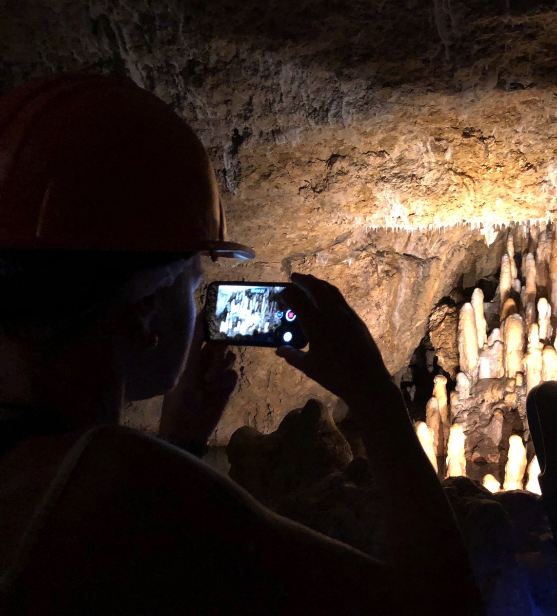 view of Harrison's cave in the dark with mood lighting
