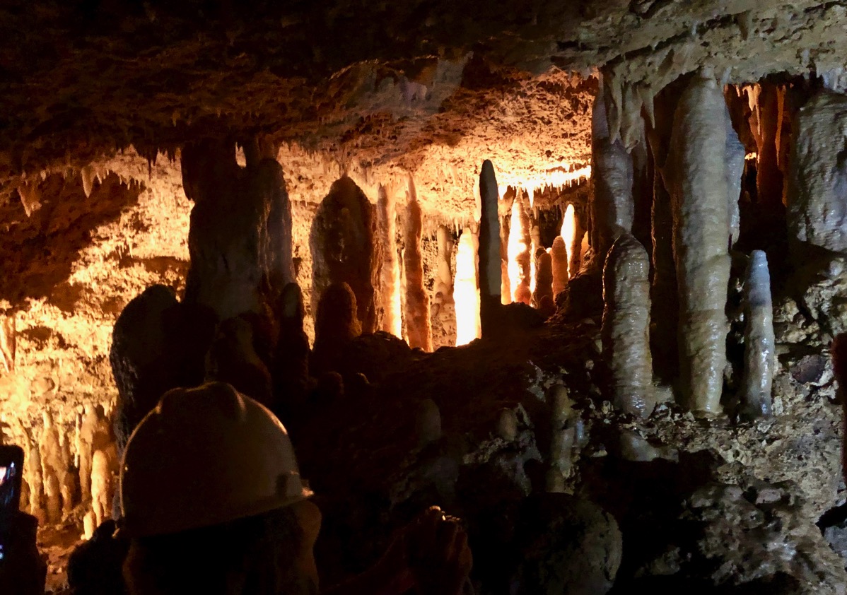Harrison's cave in the dark with the lighting and running water