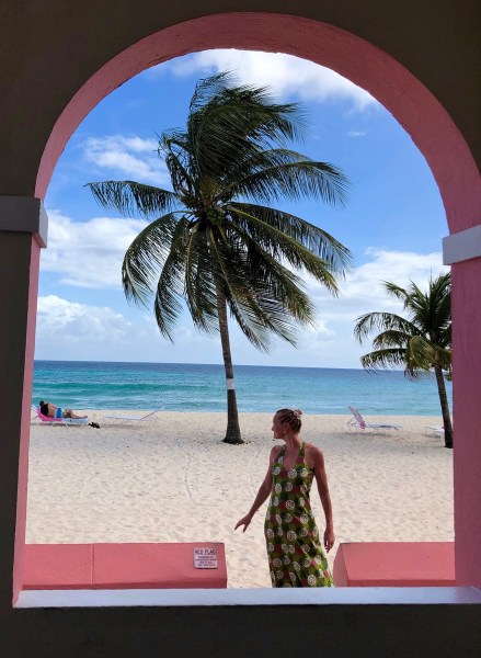 Sarah and the green dress on Dover beach in Barbados