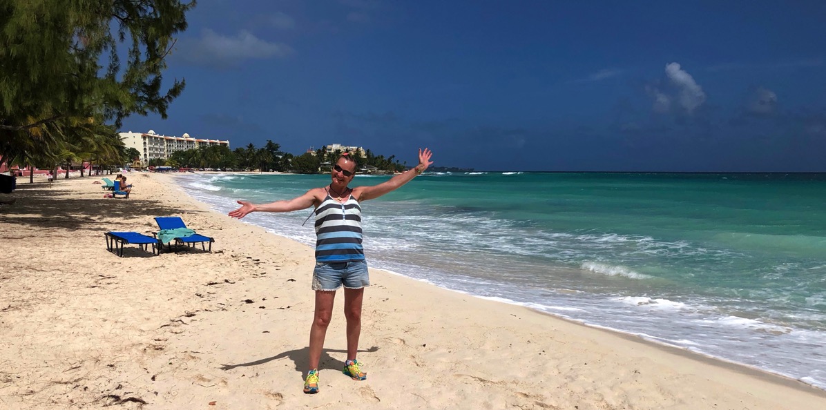 Sarah stood on the beach in arbados